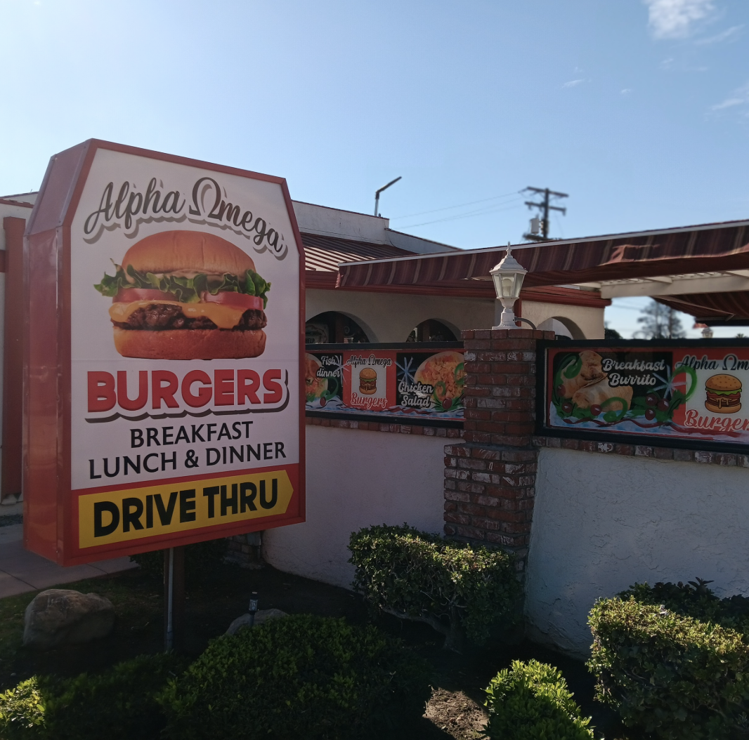 The iconic Alpha and Omega Burger Restaurant gets decorated for the holiday season while serving local favorites.